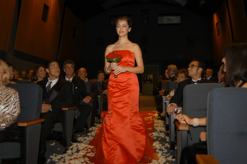 Bridesmaid in red dress | Museum of Photographic Arts Wedding | ©William Bay Photographic Arts